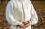 White 1770's Waistcoat from Samson Historical being worn outdoors.