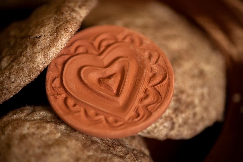 https://www.samsonhistorical.com/cdn/shop/products/Cookie-Keeper-heart-design-pottery_1200x.jpg?v=1665675190